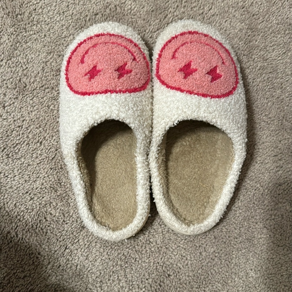 Pink smiley face slippers